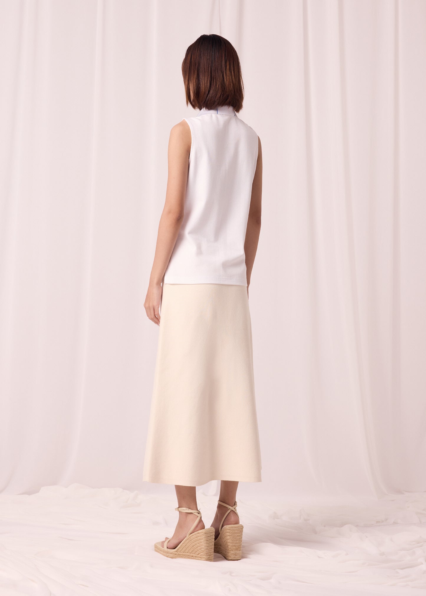 CLOUD DANCER WOMEN TAPERED FIT SLEEVELESS POLO WITH FABRIC PRINT COLLAR