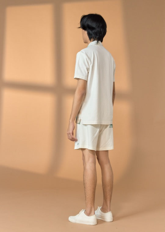 เสื้อคิวบันแขนสั้นสีอันบลีซคอตต้อนพิมพ์ลาย