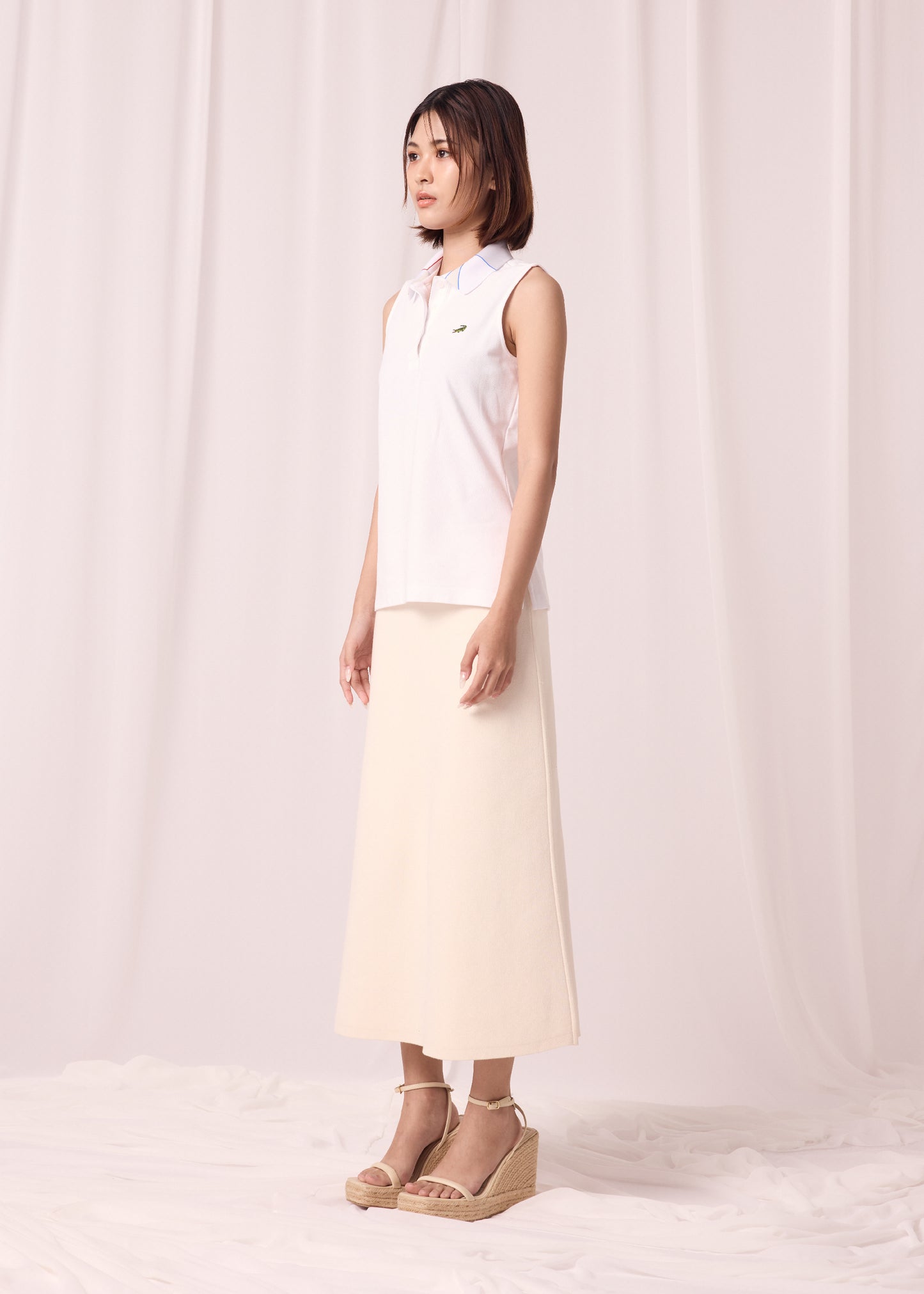 CLOUD DANCER WOMEN TAPERED FIT SLEEVELESS POLO WITH FABRIC PRINT COLLAR