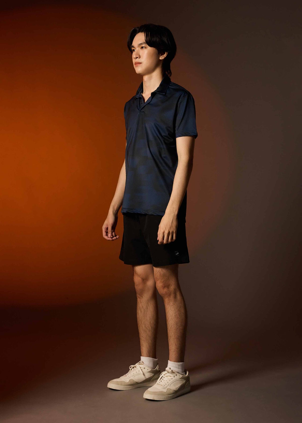 เสื้อโปโลทรงคัสตอมฟิตสีกรมพิมพ์ลาย