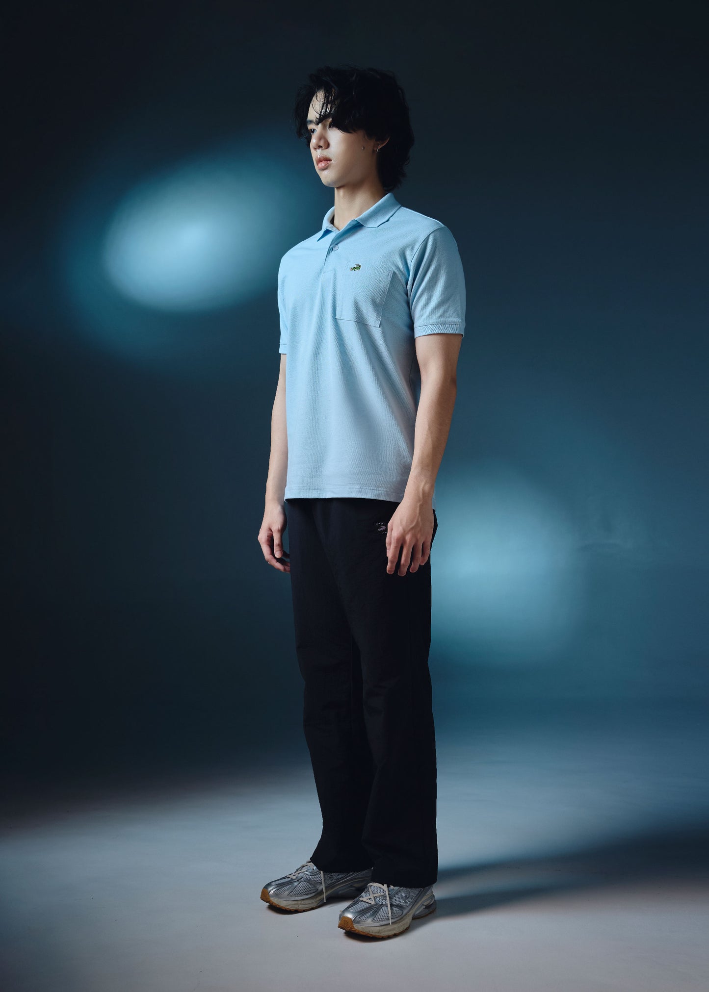 เสื้อโปโลสีสตาร์ไลท์บลูทรงเรกูล่าร์ฟิตพ​​ร้อมกระเป๋า